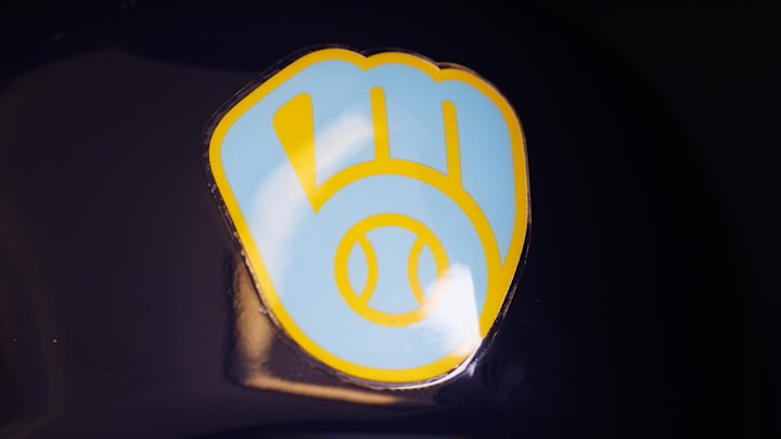 Jun 18, 2023; Milwaukee, Wisconsin, USA; A Milwaukee Brewers logo on a batting helmet in the dugout prior to the game against the Pittsburgh Pirates at American Family Field. Mandatory Credit: Jeff Hanisch-Imagn Images Jun 18, 2023; Milwaukee, Wisconsin, USA; A Milwaukee Brewers logo on a batting helmet in the dugout prior to the game against the Pittsburgh Pirates at American Family Field. Mandatory Credit: Jeff Hanisch-Imagn Images