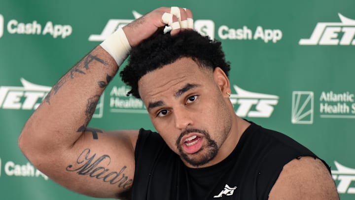 Jul 24, 2025; Florham Park, NY, USA; New York Jets guard Alijah Vera-Tucker (75) speaks to the media during training camp at Atlantic Health Jets Training Center. Mandatory Credit: John Jones-Imagn Images