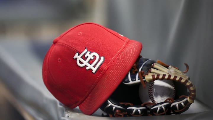 Sep 17, 2018; Atlanta, GA, USA; Detailed view of a St. Louis Cardinals hat and glove in the dugout against the Atlanta Braves in the first inning at SunTrust Park. Mandatory Credit: Brett Davis-Imagn Images
Sep 17, 2018; Atlanta, GA, USA; Detailed view of a St. Louis Cardinals hat and glove in the dugout against the Atlanta Braves in the first inning at SunTrust Park. Mandatory Credit: Brett Davis-Imagn Images