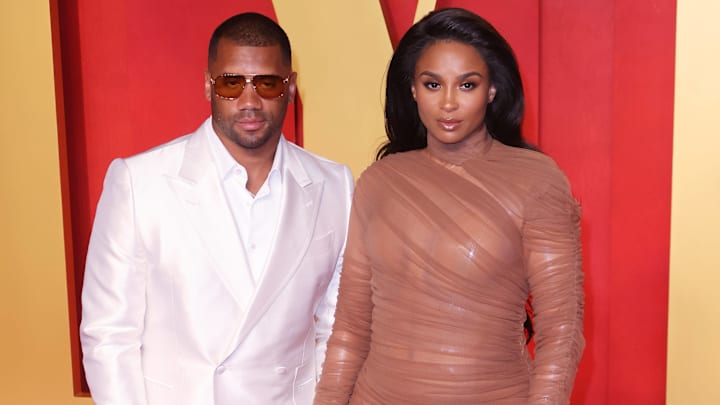 Russell Wilson, Ciara attend the 2024 Vanity Fair Oscar Party Hosted By Radhika Jones at Wallis Annenberg Center for the Performing Arts.