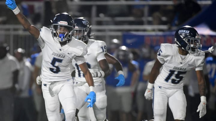Dorman Cavaliers celebrate after an interception Friday, Sept. 26, 2025 during SCHSL football game against the Byrnes Rebels at Byrnes High School in Duncan, South Carolina.