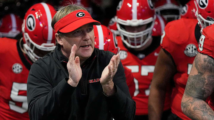 Georgia coach Kirby Smart takes the field with his team before the start of the SEC championship game against Texas in Atlanta, on Saturday, Dec. 7, 2024.