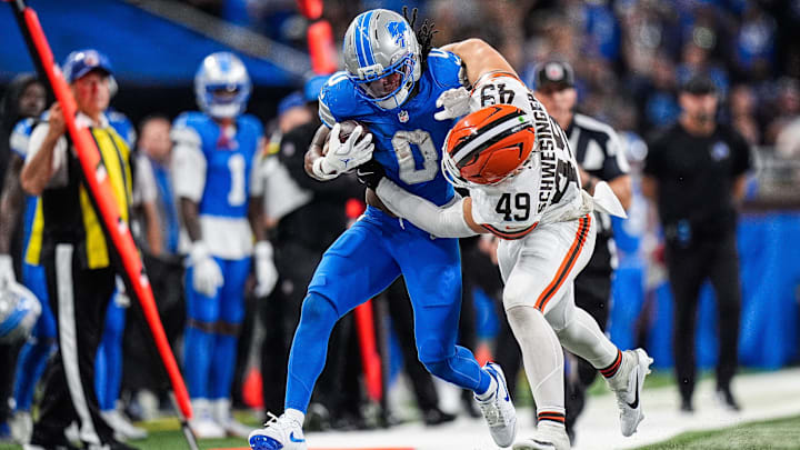 Detroit Lions running back Jahmyr Gibbs (0) runs for a first down against Cleveland Browns linebacker Carson Schwesinger (49) during the second half at Ford Field in Detroit on Sunday, Sept. 28, 2025. Detroit Lions running back Jahmyr Gibbs (0) runs for a first down against Cleveland Browns linebacker Carson Schwesinger (49) during the second half at Ford Field in Detroit on Sunday, Sept. 28, 2025.