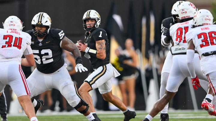 Sep 5, 2026; Nashville, Tennessee, USA; Vanderbilt Commodores quarterback Blaze Berlowitz (1) drops back to pass against the Austin Peay Governors during the first half at FirstBank Stadium. Mandatory Credit: Steve Roberts-Imagn Images Sep 5, 2026; Nashville, Tennessee, USA; Vanderbilt Commodores quarterback Blaze Berlowitz (1) drops back to pass against the Austin Peay Governors during the first half at FirstBank Stadium. Mandatory Credit: Steve Roberts-Imagn Images