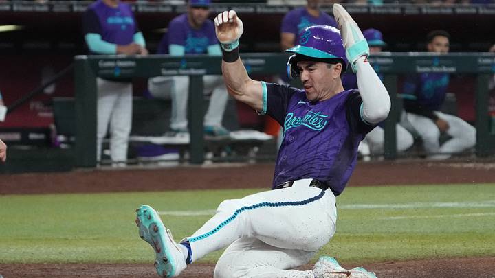 Aug 23, 2026; Phoenix, Arizona, USA;  Arizona Diamondbacks right fielder Corbin Carroll (7) scores a run against the Cincinnati Reds in the sixth inning at Chase Field.  Mandatory Credit: Rick Scuteri-Imagn Images