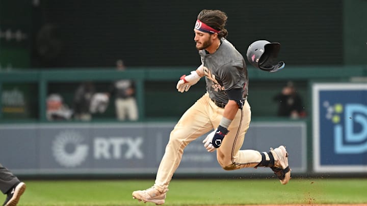 Sep 29, 2024; Washington, District of Columbia, USA; Washington Nationals right fielder Dylan Crews (3) rounds second base after hitting a triple against the Philadelphia Phillies during the sixth inning at Nationals Park. 