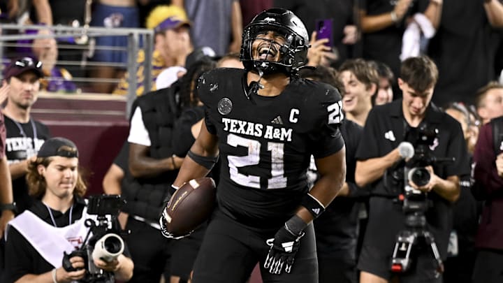 Oct 26, 2024; College Station, Texas, USA; Texas A&M Aggies linebacker Taurean York (21) reacts after catching the ball for an interception against the LSU Tigers at Kyle Field.