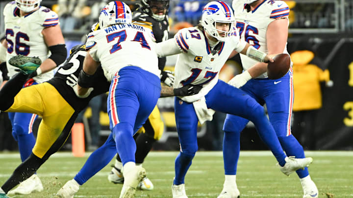 Nov 30, 2025; Pittsburgh, Pennsylvania, USA;  Buffalo Bills quarterback Josh Allen (17) comes under pressure in the pocket during the third quarter against the Pittsburgh Steelers at Acrisure Stadium.