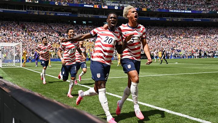  June 19, 2026; Seattle, Washington, U.S.; Folarin Balogun and Antonee Robinson of the U.S. celebrate after Australia's Cameron Burgess scores an own goal and the first goal for U.S.  Mandatory Credit: Troy Wayrynen-Imagn Images 