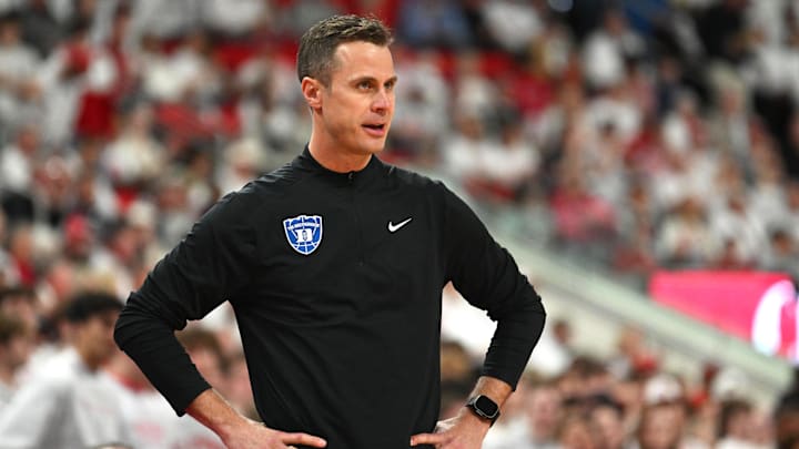 Mar 2, 2026; Raleigh, North Carolina, USA;  Duke Blue Devils head coach Jon Scheyer looks on during the first half against the NC State Wolfpack at Lenovo Center. 