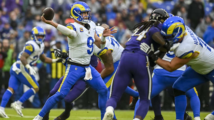 Dec 10, 2023; Baltimore, Maryland, USA;  Los Angeles Rams quarterback Matthew Stafford (9) throws dream the pocket during the first quarter against the Baltimore Ravens at M&T Bank Stadium. Mandatory Credit: Tommy Gilligan-Imagn Images