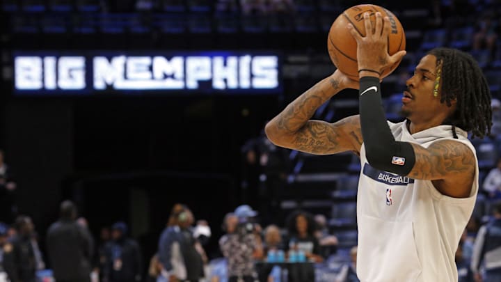 Nov 25, 2022; Memphis, Tennessee, USA; Memphis Grizzlies guard Ja Morant (12) shoots during warmups prior to the game against the New Orleans Pelicans at FedExForum. Mandatory Credit: Petre Thomas-USA TODAY Sports