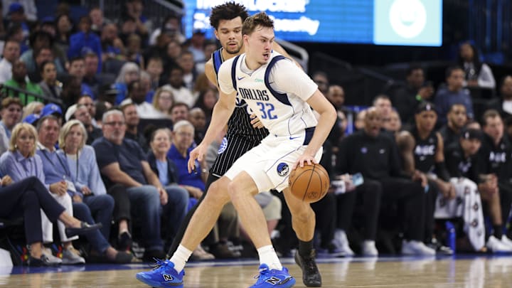 Mar 5, 2026; Orlando, Florida, USA; Dallas Mavericks forward Cooper Flagg (32) controls the ball against the Orlando Magic in the fourth quarter at Kia Center. Mandatory Credit: Nathan Ray Seebeck-Imagn Images Mar 5, 2026; Orlando, Florida, USA; Dallas Mavericks forward Cooper Flagg (32) controls the ball against the Orlando Magic in the fourth quarter at Kia Center. Mandatory Credit: Nathan Ray Seebeck-Imagn Images