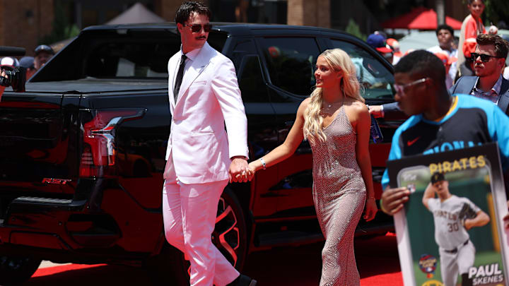 Pittsburgh Pirates pitcher Paul Skenes walks the red carpet with LSU gymnast and girlfriend Livvy Dunne before the 2024 MLB All-Star game at Globe Life Field. 