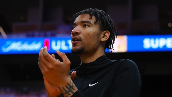 Jul 10, 2024; San Francisco, CA, USA; Miami Heat center Kel'el Ware (7) claps from the sideline during the first half against the Los Angeles Lakers at Chase Center. Mandatory Credit: Kelley L Cox-USA TODAY Sports