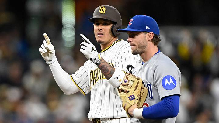 Apr 27, 2026; San Diego, California, USA; San Diego Padres third baseman Manny Machado (13) gestures after hitting a double as Chicago Cubs second baseman Nico Hoerner (2) looks on during the third inning at Petco Park. Mandatory Credit: Denis Poroy-Imagn Images Apr 27, 2026; San Diego, California, USA; San Diego Padres third baseman Manny Machado (13) gestures after hitting a double as Chicago Cubs second baseman Nico Hoerner (2) looks on during the third inning at Petco Park. Mandatory Credit: Denis Poroy-Imagn Images