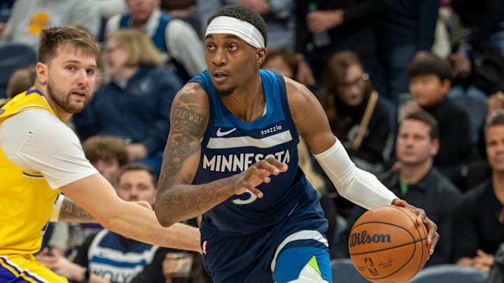 Minnesota Timberwolves forward Jaden McDaniels dribbles the ball against the Los Angeles Lakers in the second half during Game 3 of their first-round playoff series at Target Center in Minneapolis on April 25, 2025.