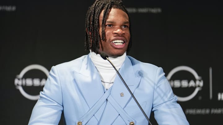 Colorado Buffaloes wide receiver/cornerback Travis Hunter speaks to the press after winning the 2024 Heisman Trophy. Mandatory