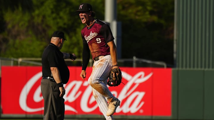 Hamilton infielder Boston Kellner (9) celebrates a triple play against Mountain View during the second round of the 6A State baseball tournament on May 6, 2025 in Tempe, Ariz.
