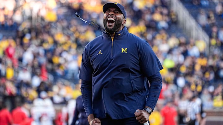 Michigan head coach Sherrone Moore fires up the student section during warm-up ahead of the New Mexico game at Michigan Stadium in Ann Arbor on Saturday, August 30, 2025.