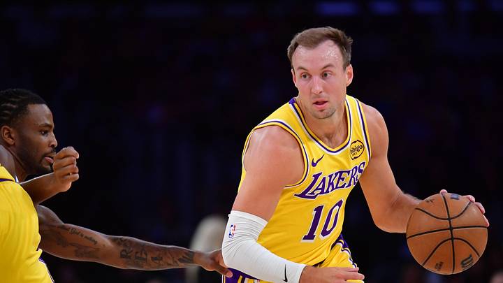 April 7, 2026; Los Angeles, California, USA; Los Angeles Lakers guard Luke Kennard (10) moves the ball against the Oklahoma City Thunder during the first half at Crypto.com Arena. Mandatory Credit: Gary A. Vasquez-Imagn Images