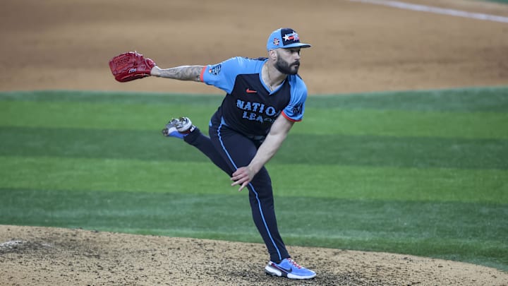 Jul 16, 2024; Arlington, Texas, USA; National League pitcher Tanner Scott of the Miami Marlins (66) pitches in the eighth inning during the 2024 MLB All-Star game at Globe Life Field.