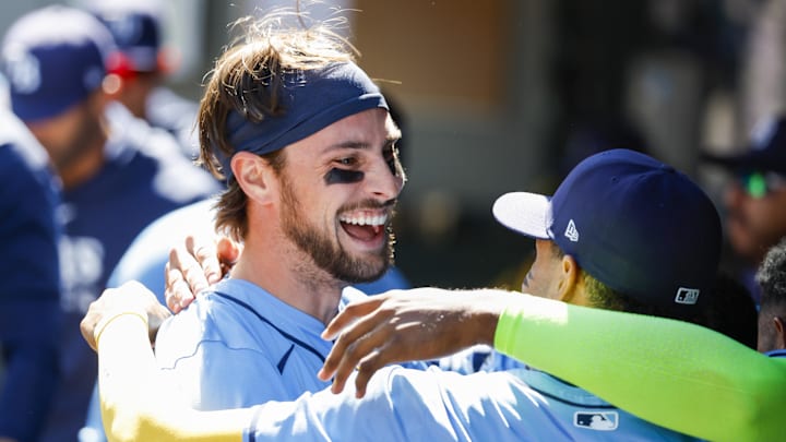 Aug 28, 2024; Seattle, Washington, USA; Tampa Bay Rays right fielder Josh Lowe (15) celebrates in the dugout after hitting a solo-home run against the Seattle Mariners during the second inning at T-Mobile Park. Mandatory Credit: Joe Nicholson-Imagn Images