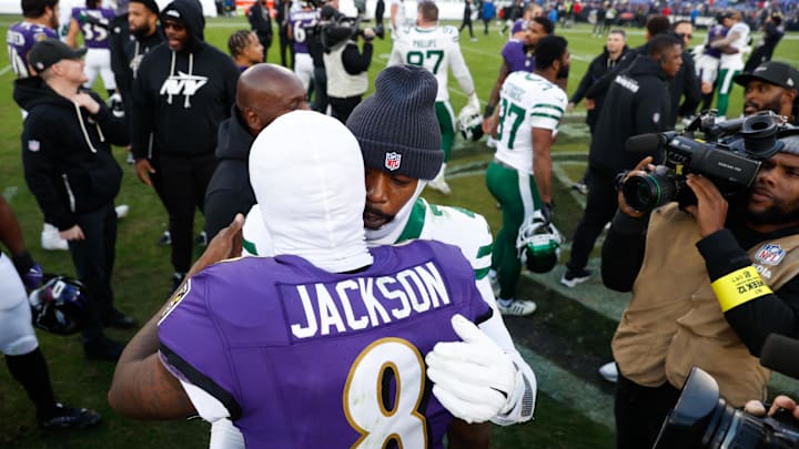 Nov 23, 2025; Baltimore, Maryland, USA; Baltimore Ravens quarterback Lamar Jackson (8) gets New York Jets quarterback Tyrod Taylor (2) on the field after the game at M&T Bank Stadium. Mandatory Credit: Peter Casey-Imagn Images Nov 23, 2025; Baltimore, Maryland, USA; Baltimore Ravens quarterback Lamar Jackson (8) gets New York Jets quarterback Tyrod Taylor (2) on the field after the game at M&T Bank Stadium. Mandatory Credit: Peter Casey-Imagn Images