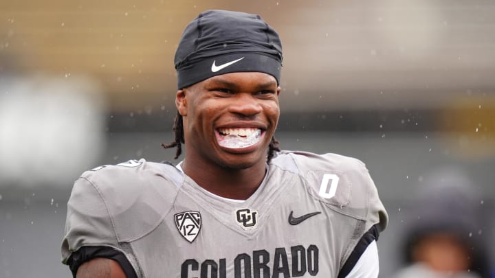 Apr 27, 2024; Boulder, CO, USA; Colorado Buffaloes cornerback Travis Hunter (12) warms up before a spring game event at Folsom Field. Mandatory Credit: Ron Chenoy-USA TODAY Sports