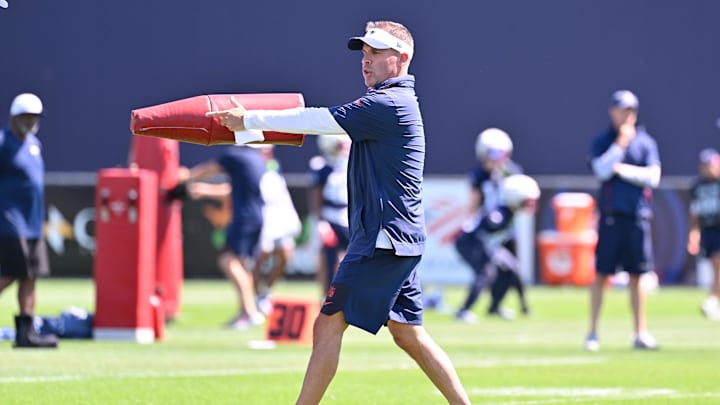 Jul 23, 2025; Foxborough, MA, USA; New England Patriots offensive coordinator Josh McDaniels works with the team during training camp at Gillette Stadium. Mandatory Credit: Eric Canha-Imagn Images Jul 23, 2025; Foxborough, MA, USA; New England Patriots offensive coordinator Josh McDaniels works with the team during training camp at Gillette Stadium. Mandatory Credit: Eric Canha-Imagn Images
