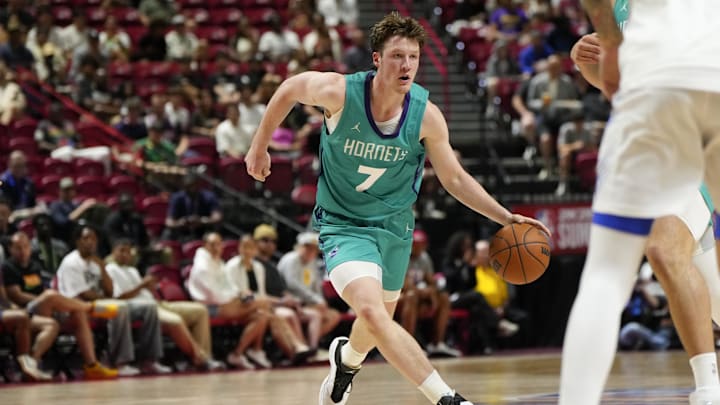 Jul 14, 2025; Las Vegas, NV, USA; Charlotte Hornets guard Kon Knueppel (7) dribbles the ball against the Dallas Mavericks during the second half of a NBA basketball game at the Thomas & Mack Center. Mandatory Credit: Lucas Peltier-Imagn Images