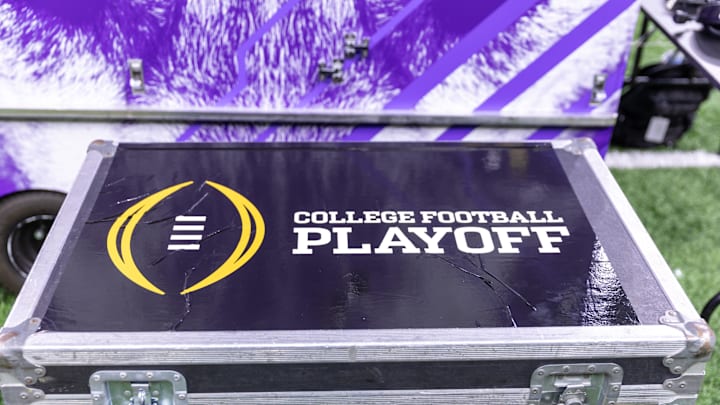 Jan 1, 2024; New Orleans, LA, USA; A general view of the College Football Playoff logo on a case on the Washington Huskies sideline before the 2024 Sugar Bowl college football playoff semifinal game between the Texas Longhorns and the Washington Huskies at Caesars Superdome. Mandatory Credit: Stephen Lew-USA TODAY Sports
