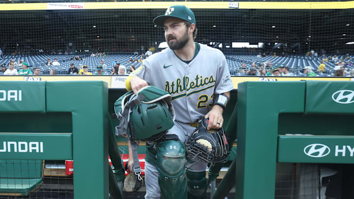 Sep 20, 2025; Pittsburgh, Pennsylvania, USA; Athletics catcher Shea Langeliers (23) heads to the dugout to warm up against the the Pittsburgh Pirates at PNC Park. Mandatory Credit: Charles LeClaire-Imagn Images