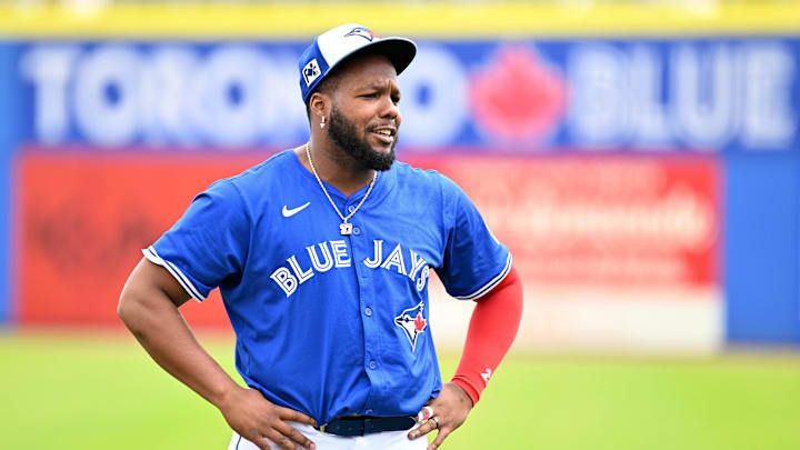 Dunedin, Florida, USA; Toronto Blue Jays designated hitter Vladimir Guerrero Jr. (27) warm up before the start of the spring training game against the St. Louis Cardinals the  at TD Ballpark.