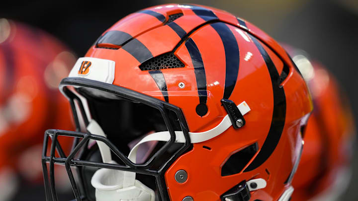 Oct 12, 2025; Green Bay, Wisconsin, USA;  General view of Cincinnati Bengals helmets on the sidelines prior to the game against the Green Bay Packers at Lambeau Field. Mandatory Credit: Jeff Hanisch-Imagn Images