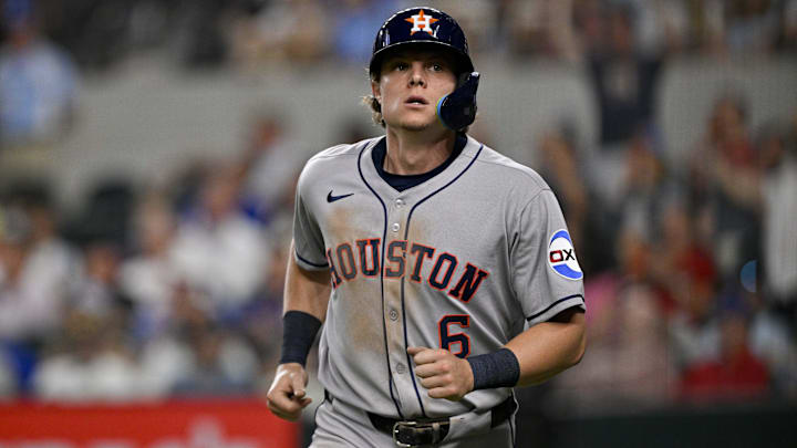 May 16, 2025; Arlington, Texas, USA; Houston Astros center fielder Jake Meyers (6) comes off the field after scoring against the Texas Rangers during the seventh inning at Globe Life Field