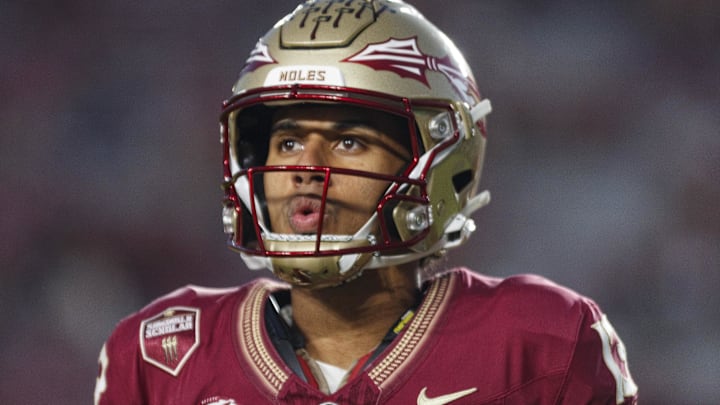 Nov 18, 2023; Tallahassee, Florida, USA; Florida State Seminoles quarterback Jordan Travis (13) during the warm ups against the North Alabama Lions at Doak S. Campbell Stadium. Mandatory Credit: Morgan Tencza-Imagn Images Nov 18, 2023; Tallahassee, Florida, USA; Florida State Seminoles quarterback Jordan Travis (13) during the warm ups against the North Alabama Lions at Doak S. Campbell Stadium. Mandatory Credit: Morgan Tencza-Imagn Images