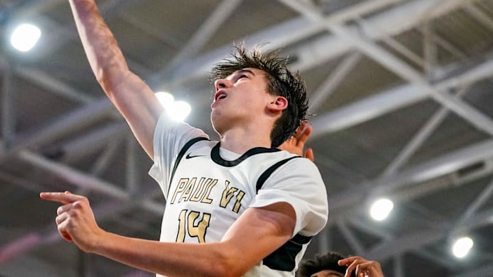 Paul VI Panthers forward Ryan Bahr (14) goes for a lay up during the third quarter of the City of Palms Classic first round game against the Garfield Heights Bulldogs at Suncoast Credit Union Arena in Fort Myers, Fla., on Thursday, Dec. 18, 2025.