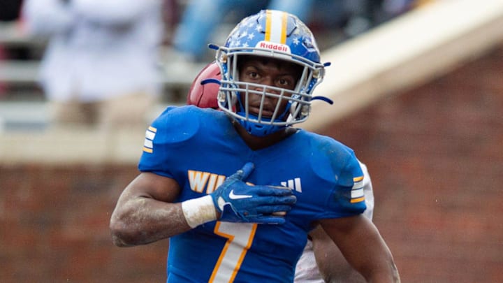 Columbia Wildcats' wide receiver Jeremiah Foxworth (7) celebrates getting a touchdown during the MHSAA 4A football state title game against the Louisville Wildcats at Vaught-Hemingway Stadium in Oxford, Miss., on Saturday, Dec. 2, 2023.