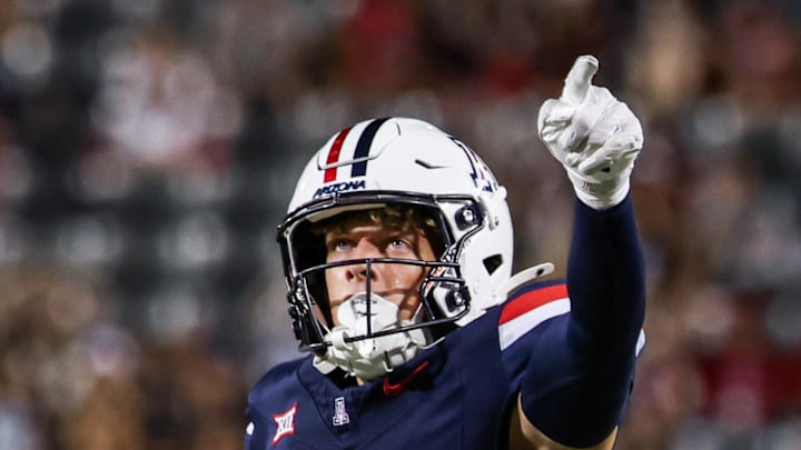Aug 30, 2025; Tucson, Arizona, USA; Arizona Wildcats wide receiver Brandon Phelps (18) points toward the end zone after securing a first down against the Hawaii Rainbow Warriors during the third quarter of the game at Arizona Stadium. Mandatory Credit: Aryanna Frank-Imagn Images