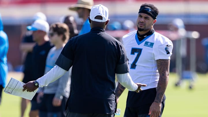 Jul 24, 2025; Charlotte, NC, USA; Carolina Panthers safety Tre'von Moehrig (7) talks with secondary coach Renaldo Hill during training camp. 