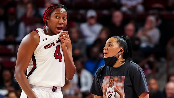 Jan 5, 2023; Columbia, South Carolina, USA; South Carolina Gamecocks forward Aliyah Boston (4) speaks with South Carolina Gamecocks head coach Dawn Staley against the Auburn Tigers in the first half at Colonial Life Arena. Mandatory Credit: Jeff Blake-Imagn Images Jan 5, 2023; Columbia, South Carolina, USA; South Carolina Gamecocks forward Aliyah Boston (4) speaks with South Carolina Gamecocks head coach Dawn Staley against the Auburn Tigers in the first half at Colonial Life Arena. Mandatory Credit: Jeff Blake-Imagn Images