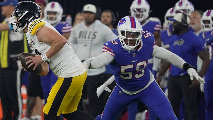 Buffalo Bills defensive lineman Andre Jones Jr. reaches out to Pittsburgh Steelers quarterback Will Howard who was running with the ball during first half action of the Bills preseason game against the Pittsburgh Steelers at Highmark Stadium on Aug. 27, 2026. Buffalo Bills defensive lineman Andre Jones Jr. reaches out to Pittsburgh Steelers quarterback Will Howard who was running with the ball during first half action of the Bills preseason game against the Pittsburgh Steelers at Highmark Stadium on Aug. 27, 2026.