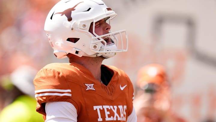 Texas Longhorns quarterback Quinn Ewers celebrates his touchdown at Royal-Memorial Stadium.