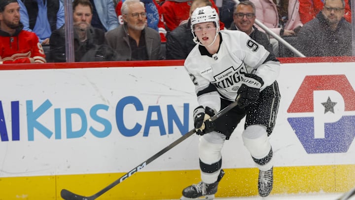 Jan 27, 2026; Detroit, Michigan, USA; Los Angeles Kings defenseman Brandt Clarke (92) handles the puck during the first period against the Detroit Red Wings at Little Caesars Arena. Mandatory Credit: Brian Bradshaw Sevald-Imagn Images