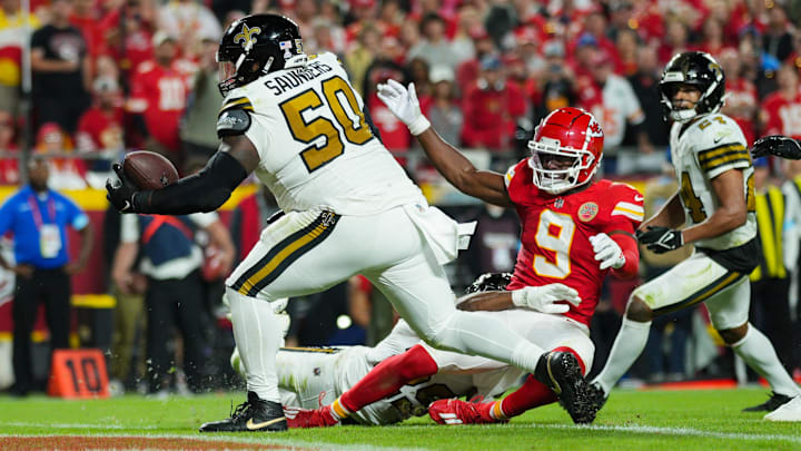 Saints defensive tackle Khalen Saunders (50) intercepts a pass intended for Chiefs receiver JuJu Smith-Schuster (9) Saints defensive tackle Khalen Saunders (50) intercepts a pass intended for Chiefs receiver JuJu Smith-Schuster (9)