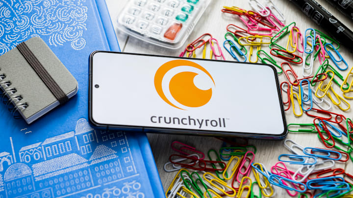 In this photo illustration, a Crunchyroll logo seen...
