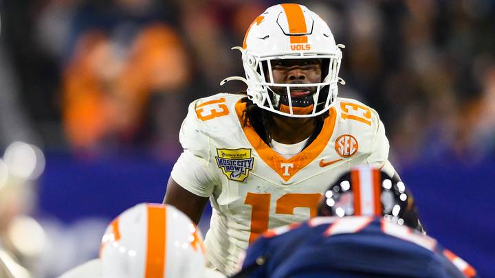 Dec 30, 2025; Nashville, TN, USA;  Tennessee Volunteers linebacker Edwin Spillman (13) peaks into the backfield against the Illinois Fighting Illini during the first half at Nissan Stadium. Mandatory Credit: Steve Roberts-Imagn Images