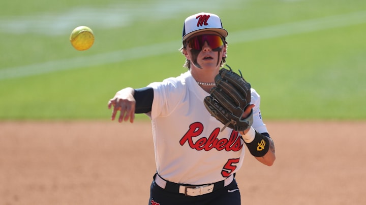 Ole Miss infielder Ashton Lansdell (5) throws to first base for an out during a game against Missouri at Jack Turner Softball Stadium. Mandatory Credit: Mady Mertens-Imagn Images