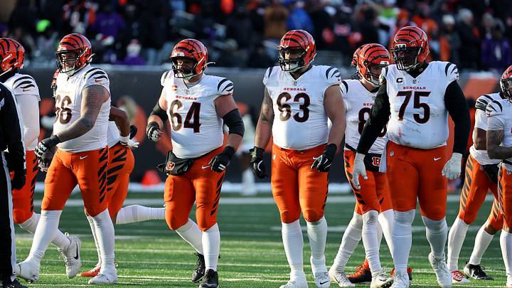 Dec 14, 2025; Cincinnati, Ohio, USA; Cincinnati Bengals center Ted Karras (64) and guard Dylan Fairchild (63) and offensive tackle Orlando Brown (75) line up for a play during the fourth quarter against the Baltimore Ravens at Paycor Stadium. Mandatory Credit: Joseph Maiorana-Imagn Images Dec 14, 2025; Cincinnati, Ohio, USA; Cincinnati Bengals center Ted Karras (64) and guard Dylan Fairchild (63) and offensive tackle Orlando Brown (75) line up for a play during the fourth quarter against the Baltimore Ravens at Paycor Stadium. Mandatory Credit: Joseph Maiorana-Imagn Images